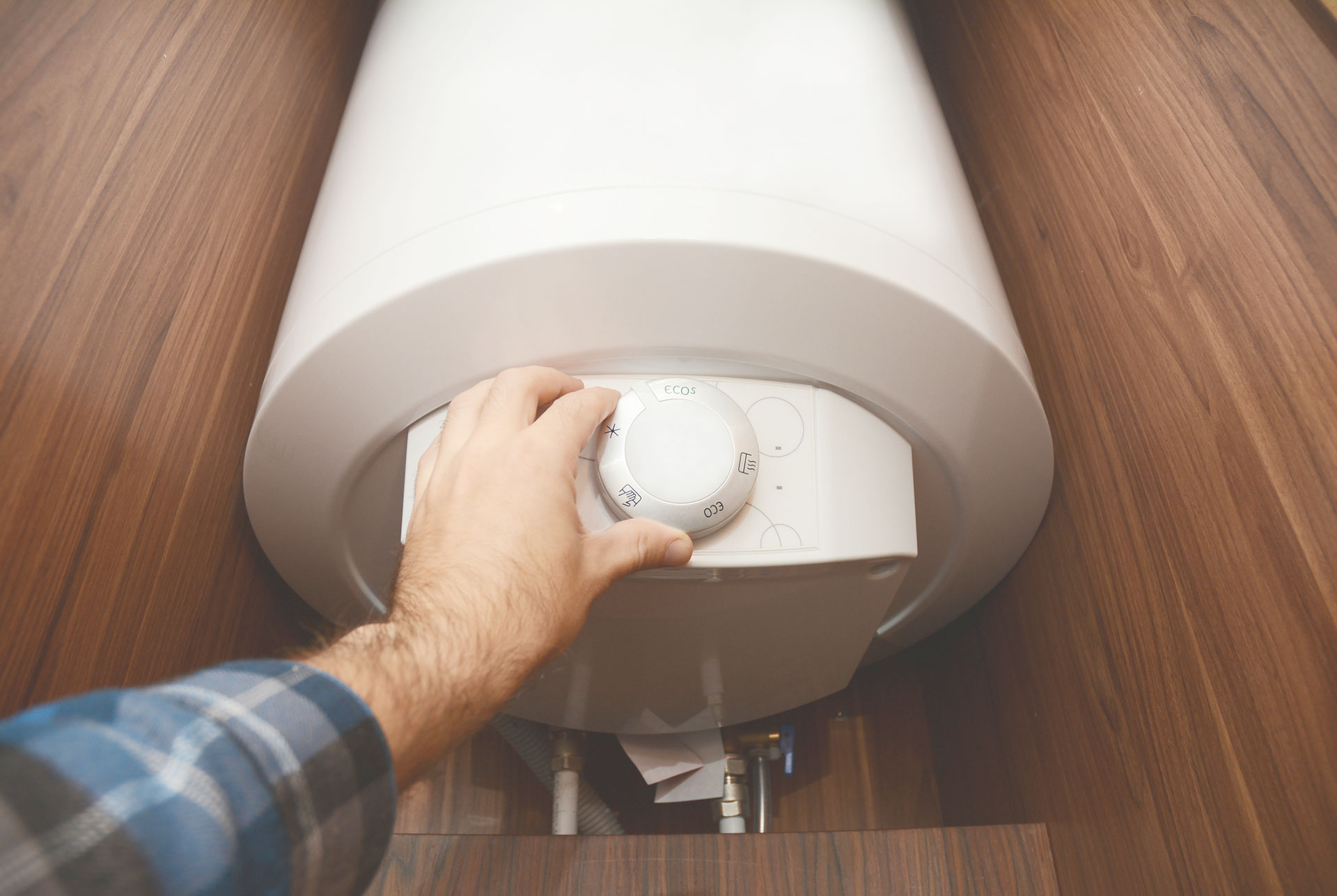 Technician Programming Oil Tank in Nassau County, NY Home